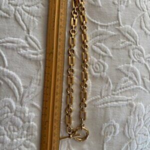 Chunky, heavy, gold tone toggle clasp necklace